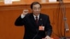 Newly elected head of the National Supervision Commission Yang Xiaodu takes the oath at the sixth plenary session of the National People's Congress (NPC) at the Great Hall of the People in Beijing, China, March 18, 2018. 