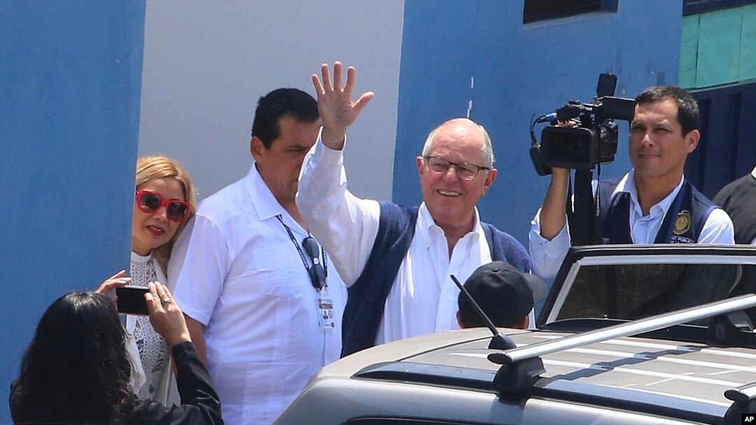 In this photo provided by the Andina News Agency, former Peruvian President Pedro Pablo Kuczynski waves as he leaves a medical branch of the prosecutor’s office, in Lima, Peru, April 10, 2019.