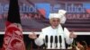 FILE - Afghanistan's President Ashraf Ghani speaks to religious leaders during an anti-corruption conference in Kabul, Afghanistan, Sept. 1, 2015. Ghani will host an international peace conference Tuesday .