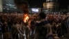 Israelis light a bonfire during a protest after Prime Minister Benjamin Netanyahu dismissed popular defense minister Yoav Gallant, in Tel Aviv, Israel, Nov. 5, 2024.