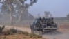 FILE - Members of the Cameroonian Rapid Intervention Force patrol on the outskirts of Mosogo in the Far North region of the country where Boko Haram jihadist have been active for years, March 21, 2019.