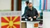 A man casts his ballot for the presidential election in Skopje, North Macedonia, May 5, 2019.