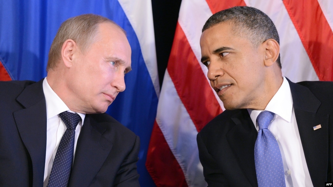 U.S. President Barack Obama (R) listens to Russian President Vladimir Putin after their bilateral meeting in Los Cabos, Mexico on June 18, 2012, on the sidelines of the G20 summit.