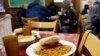 A lunch meal is served in a New York City soup kitchen (file photo).