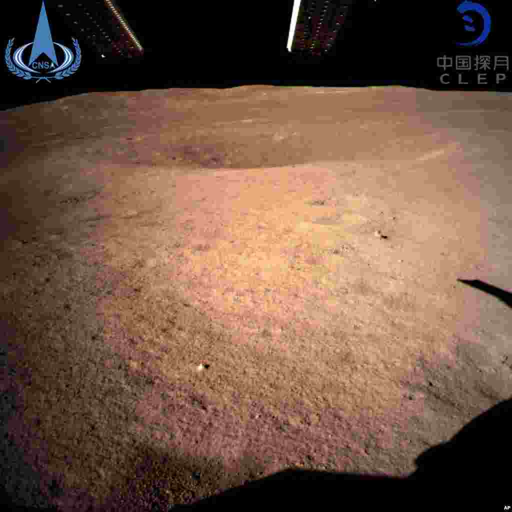 In this photo provided by China National Space Administration via Xinhua News Agency, the first image of the moon&#39;s far side taken by China&#39;s Chang&#39;e-4 probe. A Chinese spacecraft made the first-ever landing on the far side of the moon, state media said.