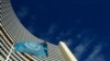 FILE - The flag of the International Atomic Energy Agency flies in front of its headquarters in Vienna, Austria.