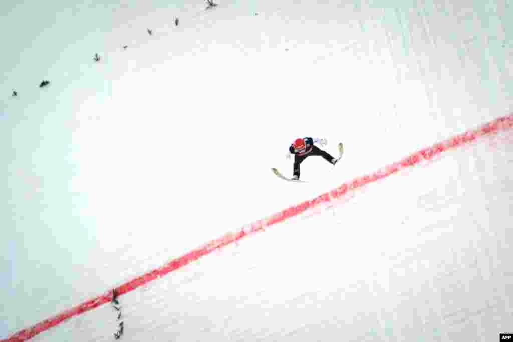 Germany's Markus Eisenbichler competes in the second round of the FIS Ski Jumping World Cup Flying Hill Individual competition in Planica, Slovenia.