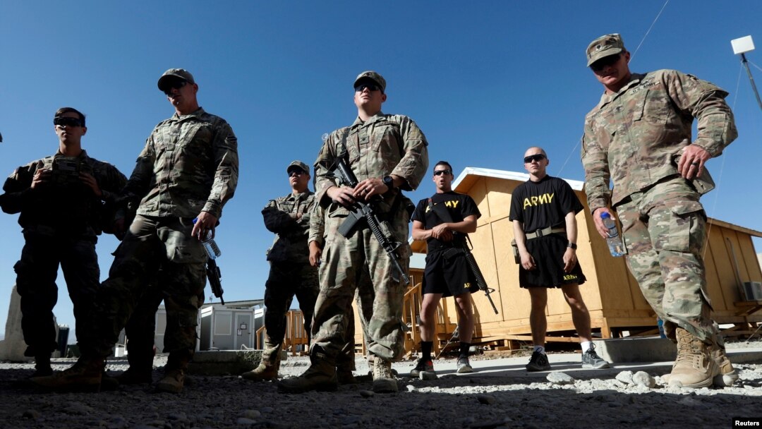 U.S. troops listen to a security briefing before leave their base in Logar province, Afghanistan, Aug. 5, 2018.