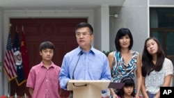 U.S. Ambassador to China Gary Locke speaks during a news conference in the courtyard of his residence in Beijing, China, Aug. 14, 2011.
