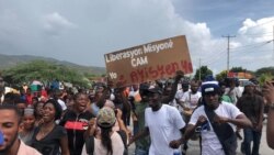 Manifestan nan Titanyen nan komin Kabare pran lari pou mande liberasyon misyone Ameriken gang 400 Mawozo kidnape Samdi pase a. (Foto: Matiado Vilme)