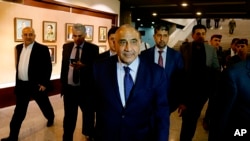 Iraqi Prime Minister Adel Abdul Mahdi issued a decree heavily curbing the powers of mostly Iranian-backed Shi'ite militias, July 1, 2019. 