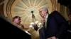Senate Majority Leader Mitch McConnell of Ky., right, with, from left, Sen. John Barrasso, R-Wyo., Sen. John Thune, R-S.D. and Senate Majority Whip John Cornyn of Texas, prepares to talk to reporters on Capitol Hill in Washington, July 25, 2017.