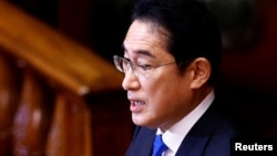 Japan's Prime Minister Fumio Kishida delivers his policy speech during the first day of an ordinary session at the lower house of parliament in Tokyo, Japan Jan. 23, 2023. 