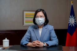In this photo released by the Taiwan Presidential Office, Taiwan's President Tsai Ing-wen speaks at the presidential office in Taipei, Taiwan, Sunday, June 20, 2021.