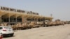 FILE - UAE military vehicles are seen at the international airport of the southern port city of Aden, Yemen.