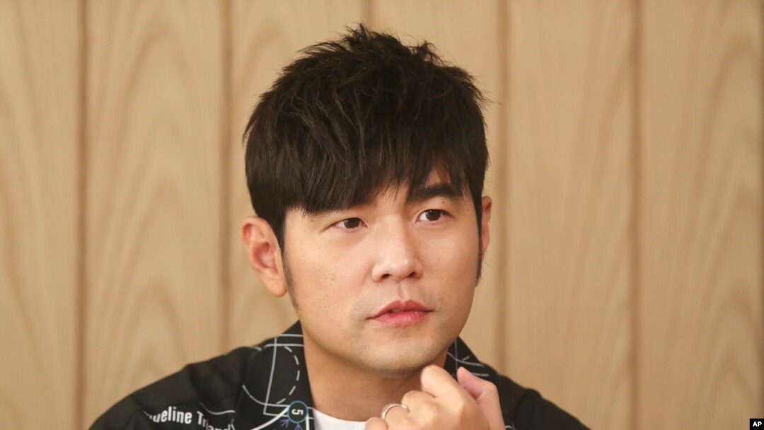 In this April 26, 2020, photo, Mandopop superstar Jay Chou talks about his latest Netflix show "J-Style Trip" and life with his children during an interview with The Associated Press in Taipei, Taiwan. Chou is bringing a little magic into viewers’…