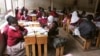 FILE - Pupils at the Toi Primary School in Nairobi, Kenya sit in a classroom and study without a teacher, because the teachers are on strike. Members of the Kenya National Union of Teachers and the Kenya Union of Post Primary Education Teachers went on strike for several weeks earlier this year after the government refused to increase salaries.