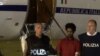 Two weeks after his arrest in Sudan, Italian police escort the man authorities believe is Medhane Yehdego Mered upon his arrival at Ciampino's airport, on the outskirts of Rome, June 7, 2016.
