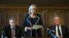 Dame Cheryl Gillan with Charles Walker (L) and Bob Blackman (R) read out the results of the first ballot in the Tory leadership ballot at the Houses of Parliament in Westminster, London, June 13, 2019.