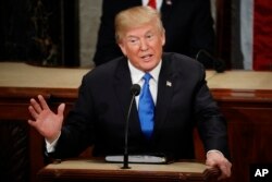 In this Jan. 30, 2018 file photo, President Donald Trump delivers his State of the Union address to a joint session of Congress on Capitol Hill in Washington.