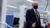 Fujifilm Diosynth Biotechnologies CEO Martin Meeson, right, speaks as President Donald Trump participates in a tour of Bioprocess Innovation Center at Fujifilm Diosynth Biotechnologies, July 27, 2020, in Morrisville, North Carolina.