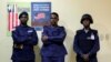 FILE - Police officers stand guard at National Election Commission headquarters in Monrovia, Liberia, Oct. 11, 2017. 