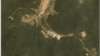 A combination of two satellite images taken on June 22, 2018 (top) and July 22, 2018 show activity at the Sohae rocket launch site in North Korea. (Planet Labs Inc/Handout via Reuters)