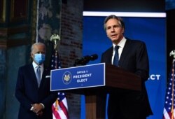 Nominated Secretary of State Antony Blinken participates as US President Joe Biden speaks during a cabinet announcement event in Wilmington, Delaware, on Nov. 24, 2020.