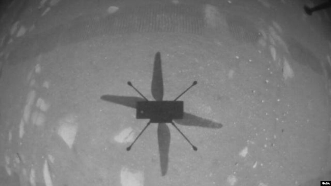 NASA’s Ingenuity Mars Helicopter captured this shot as it hovered over the Martian surface on April 19, 2021, during the first instance of powered, controlled flight on another planet.