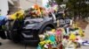 US Officials Investigate Background of Man Charged in Colorado Attack 
