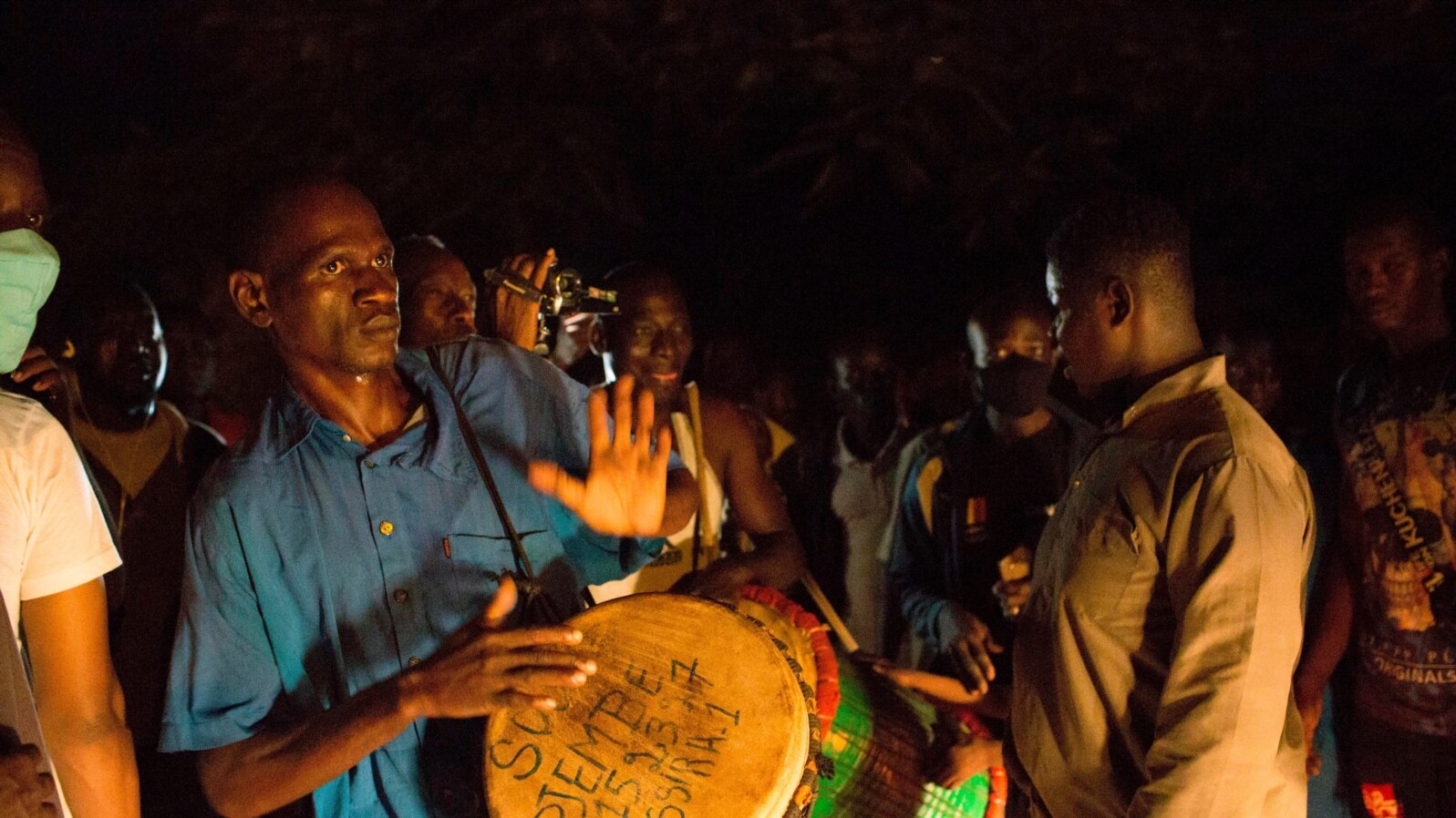 FILE - Supporters of Malian politician Soumaila Cisse celebrate in front of his house in Bamako, Mali, on Oct. 8, 2020, after hearing the news that he landed at the Bamako airport after having been freed from captivity.
