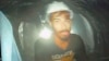This screen grab image provided by the Uttarakhand State Disaster Response Force (SDRF) shows one of the 40 workers trapped inside a collapsed tunnel in Silkyara, in the northern Indian Uttarakhand state, India, Nov. 21, 2023. 