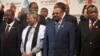 FILE - Sudanese President Omar Hassan al-Bashir, second from right, stands with other leaders during a photo opportunity at an African Union summit in Johannesburg, June 14, 2015.