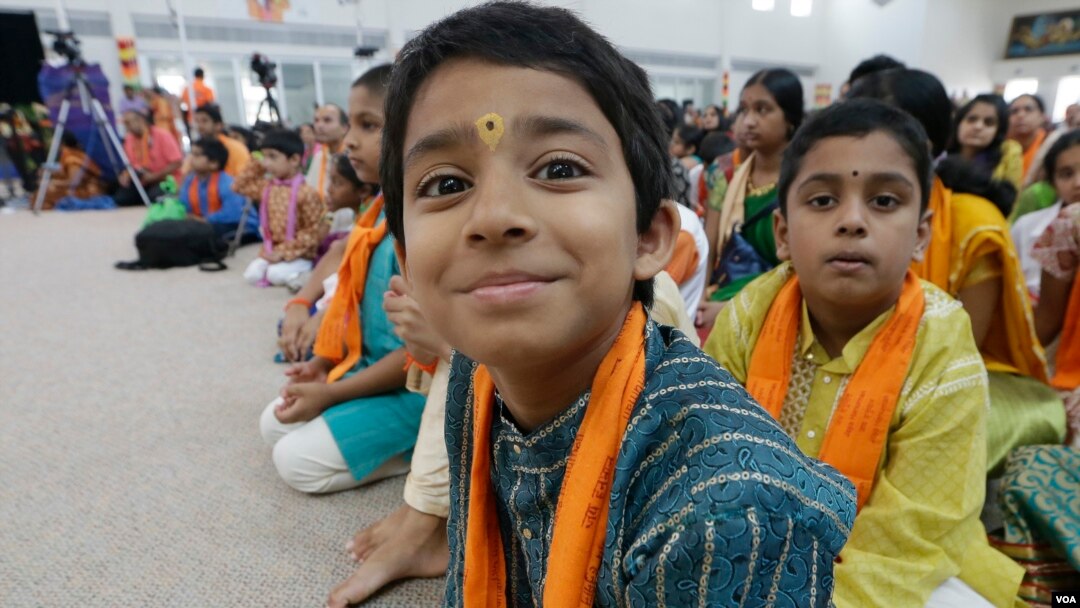 FILE - Devotees participate in events at the Karya Siddhi Hanuman Temple in 2015 that serves the Asian-Indian community in Frisco, Texas. Immigrants from China and India, many with student or work visas, have overtaken Mexicans as the largest groups coming into the U.S., according to the U.S Census Bureau.