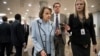 Sen. Dianne Feinstein, D-Calif., the ranking member on the Senate Judiciary Committee, takes a reporter's question as she walks to the Senate for a vote, at the Capitol in Washington, Jan. 11, 2018.