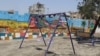 Swings are seen at a park in central Raqqa that was recently restored, nearly two years after IS was removed from the city, in Raqqa, Syria, June 25, 2019. (Courtesy photo)