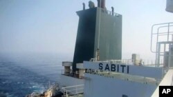 This photo released by the official news agency of the Iranian Oil Ministry, SHANA, shows Iranian oil tanker Sabiti traveling through the Red Sea, Oct. 11, 2019.