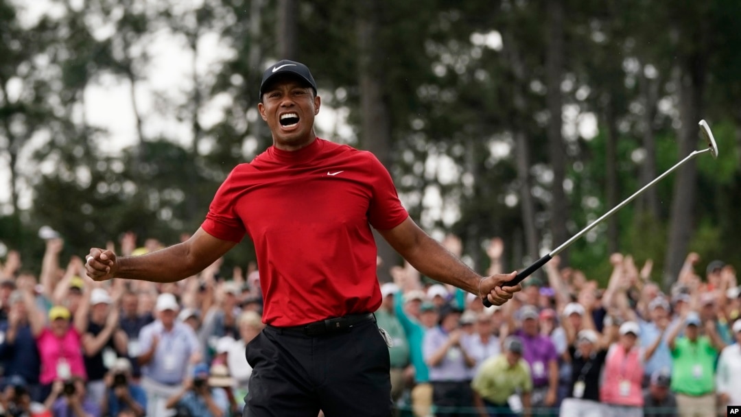 Tiger Woods reacts as he wins the Masters golf tournament Sunday, April 14, 2019, in Augusta, Ga.