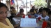 "Kariton" or pushcart in Filipino is on display at a pushcart classroom orientation in one of the toughest neighborhoods of Caloocan, the poorest municipality in Metro Manila, May 25, 2012. (S. Orendain/VOA)