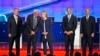 Democratic presidential candidates, from left, former Virginia Sen. Jim Webb, Sen. Bernie Sanders of Vermont, former Secretary of State Hillary Clinton, former Maryland Gov. Martin O'Malley and former Rhode Island Gov. Lincoln Chafee, take the stage befor
