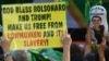 Supporters of Brazilian right-wing presidential candidate Jair Bolsonaro take part in a rally along Paulista Avenue in Sao Paulo Brazil, Oct. 21 2018. Brazil appears poised to elect Bolsonaro, a populist far-right veteran politician, as its next president