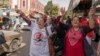 Supporters of President Abdel Fattah al-Sissi try to drum up support in a last-minute bid to draw voters to the polls, March 27, 2018. 