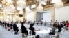 French President Emmanuel Macron, French Prime Minister Jean Castex and members of the new government attend their first Cabinet meeting at the Elysee Palace in Paris, July 7, 2020.