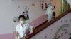 30일 북한 평양의 한 초등학교에서 신종 코로나바이러스 감염 예방을 위해 방역 요원이 계단을 소독하고 있다. 