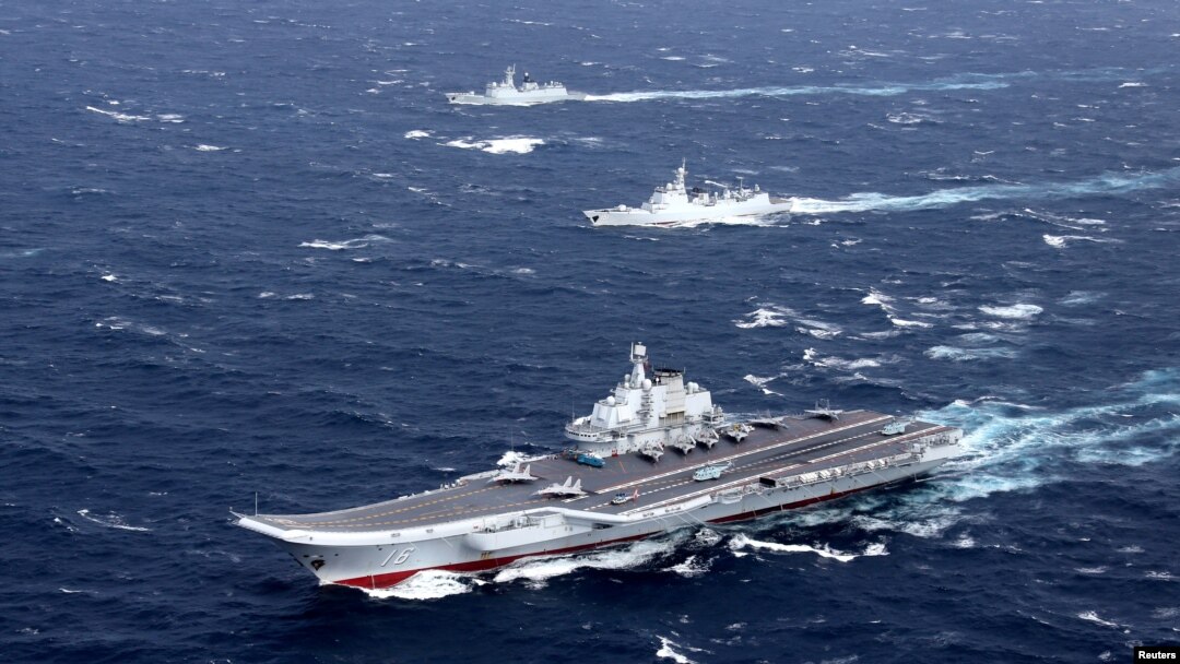 China's Liaoning aircraft carrier with accompanying fleet conducts a drill in an area of South China Sea, in this undated photo taken December 2016. 