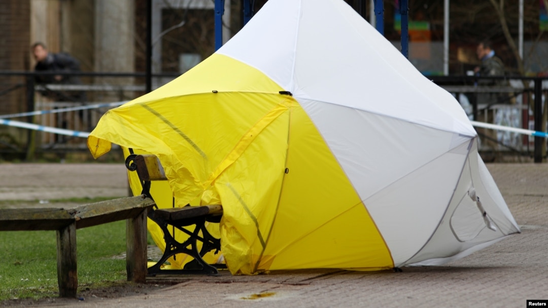 The forensic tent, covering the bench where Sergei Skripal and his daughter Yulia were found, is blown out of position in the centre of Salisbury, Britain, March 8, 2018