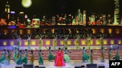 China's new First Lady Peng Liyuan performs at 10th anniversary ceremonies of the Reunification, Hong Kong, June 30, 2007.