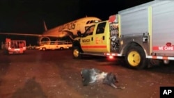 FILE - This photograph released by the state-run Saudi Press Agency shows debris on the tarmac of Abha Airport after an attack by Yemen's Houthi rebels, in Abha, Saudi Arabia, June 12, 2019. 