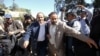 A member of the Houthi delegation participating in the negotiations in Sweden departs from Sanaa airport, Yemen, Dec. 4, 2018.