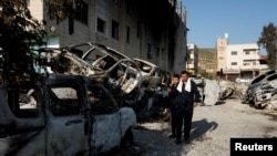 Aftermath of an incident where a Palestinian gunman killed two Israeli settlers near Hawara